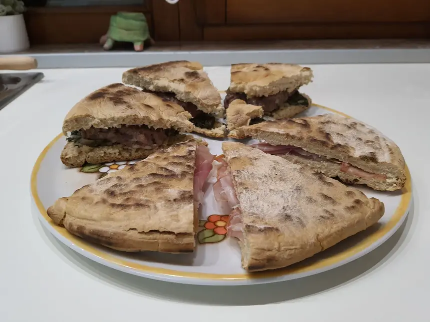 10 Most Popular Umbrian Dishes: A Journey Through Italy's Green Heart 4 Torta al Testo